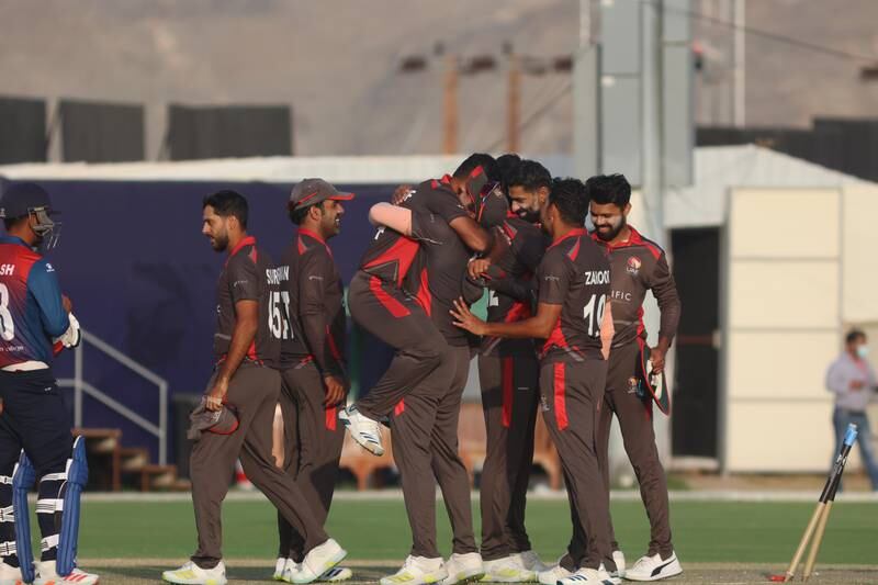 UAE celebrate victory over Nepal in the T20 World Cup Qualifier at the Oman Cricket Academy in Muscat.