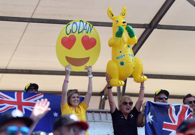 Daniel Ricciardo hold signs and an inflatable kangaroo in the Fangio Stand prior to the start of the 2019 Formula One Grand Prix of Australia at the Albert Park Grand Prix Circuit in Melbourne, Australia.  EPA