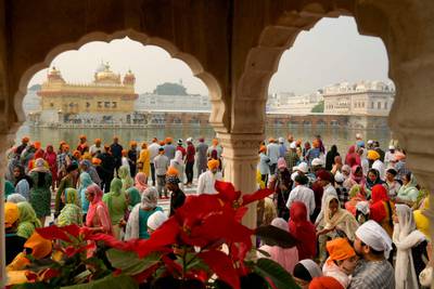 Sikh devotees pay respect at the Golden Temple in Amritsar on October 30, the birthday of Sikh Guru Ram Das. AFP