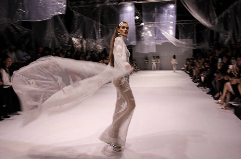 A model spins on the catwalk. EPA