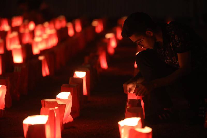 Paper lanterns in the shape of a Lebanese flag mark one month since the city's deadly explosion. Getty Images