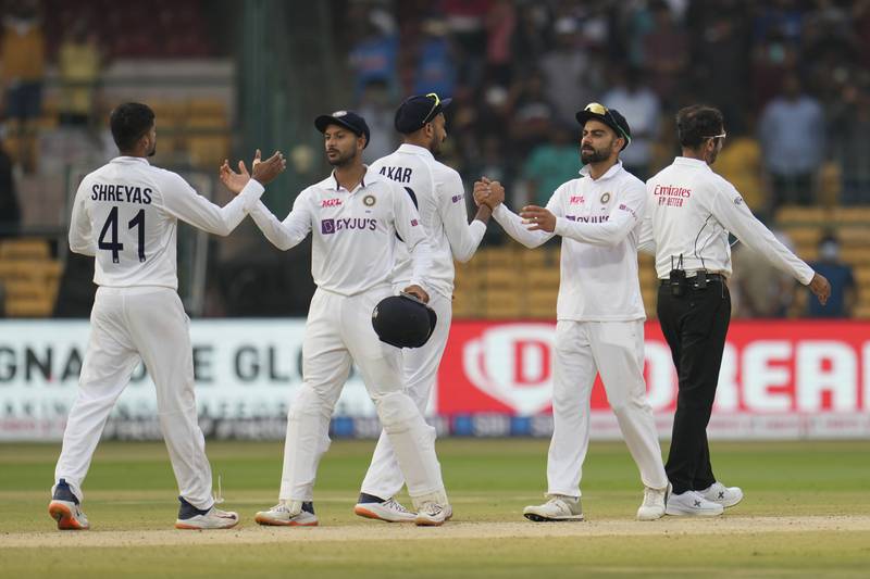 India players celebrate their victory over Sri Lanka. AP