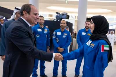 Mr El Sisi greets UAE astronaut Noura Al Matrooshi 