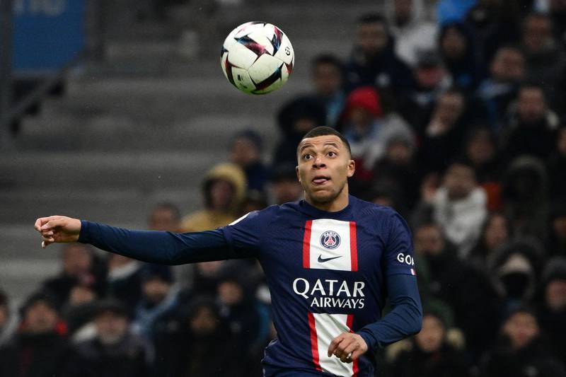 Paris Saint-Germain's French forward Kylian Mbappe eyes the ball. AFP