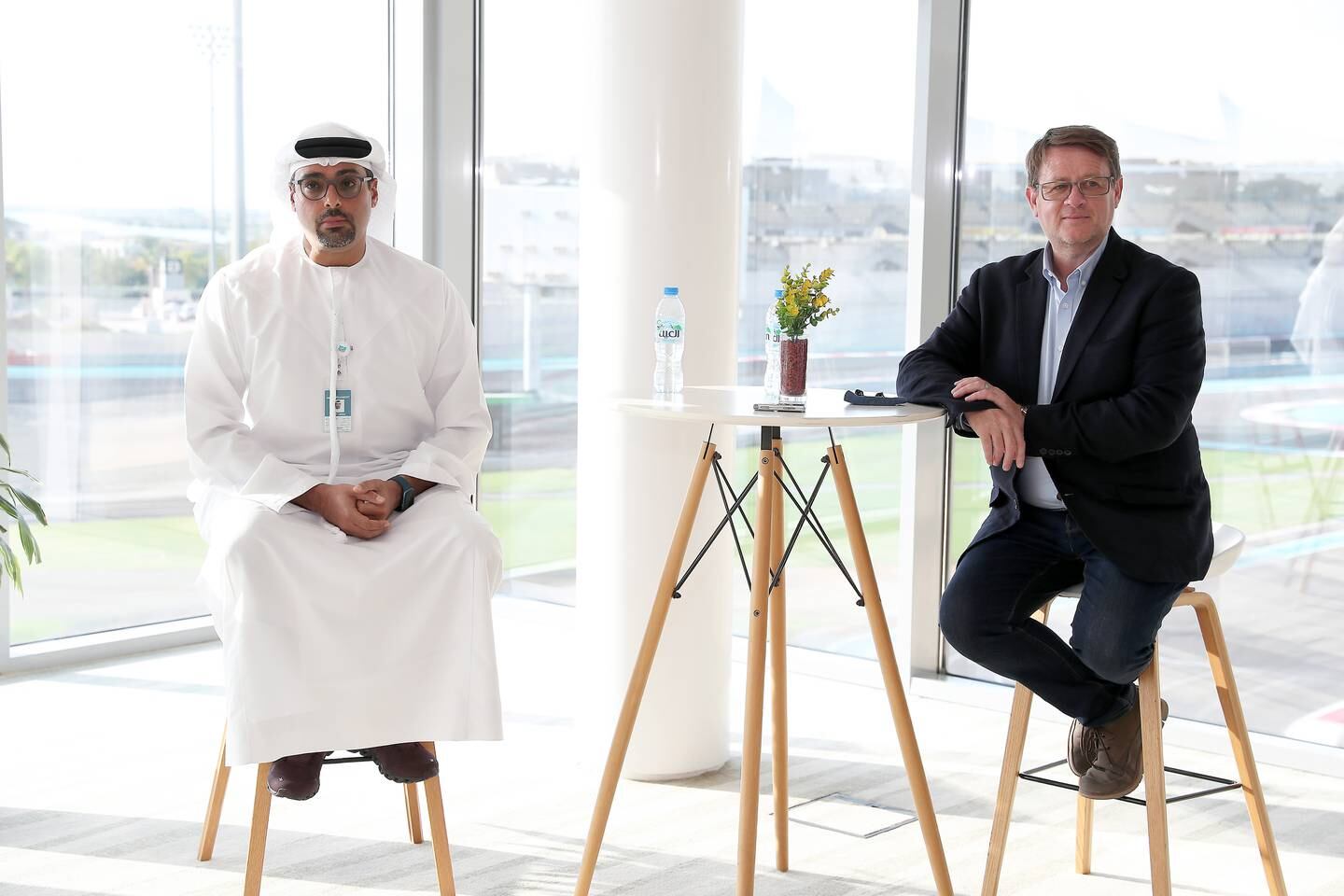 Saif Al Noaimi, deputy CEO of Abu Dhabi Motorsports Management, and Mark Hughes, track consultant, talk about track modifications to Yas Marina Circuit. Pawan Singh / The National