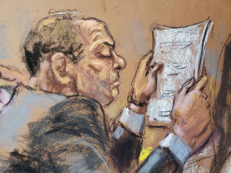 Harvey Weinstein sits at the defense table reading papers during jury deliberations in his sexual assault trial in the Manhattan borough of New York City, New York, U.S., February 24, 2020 in this courtroom sketch.  REUTERS/Jane Rosenberg