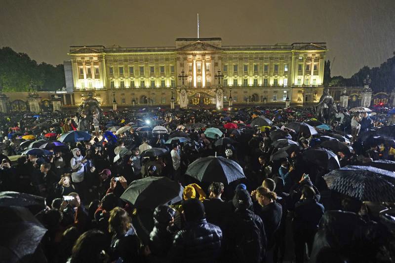 People outside Buckingham Palace in London after the announcement of the death of Queen Elizabeth II. AP