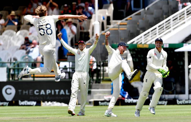 Ben Stokes, second right, after taking the catch to dismiss Pieter Malan. Getty