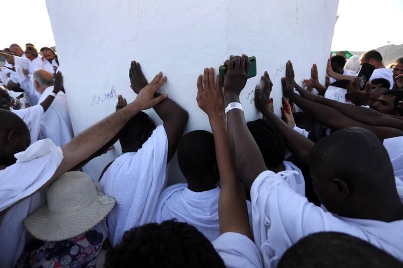 Pilgrims pray as they gather at Mount Arafat. EPA