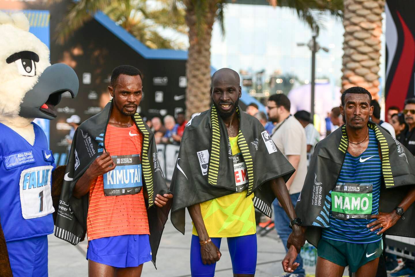 Der Kenianer Timothy Kiplagat (Mitte) gewann den Adnoc Abu Dhabi Marathon der Männer.  Khushnum Bhandari / Der Nationale