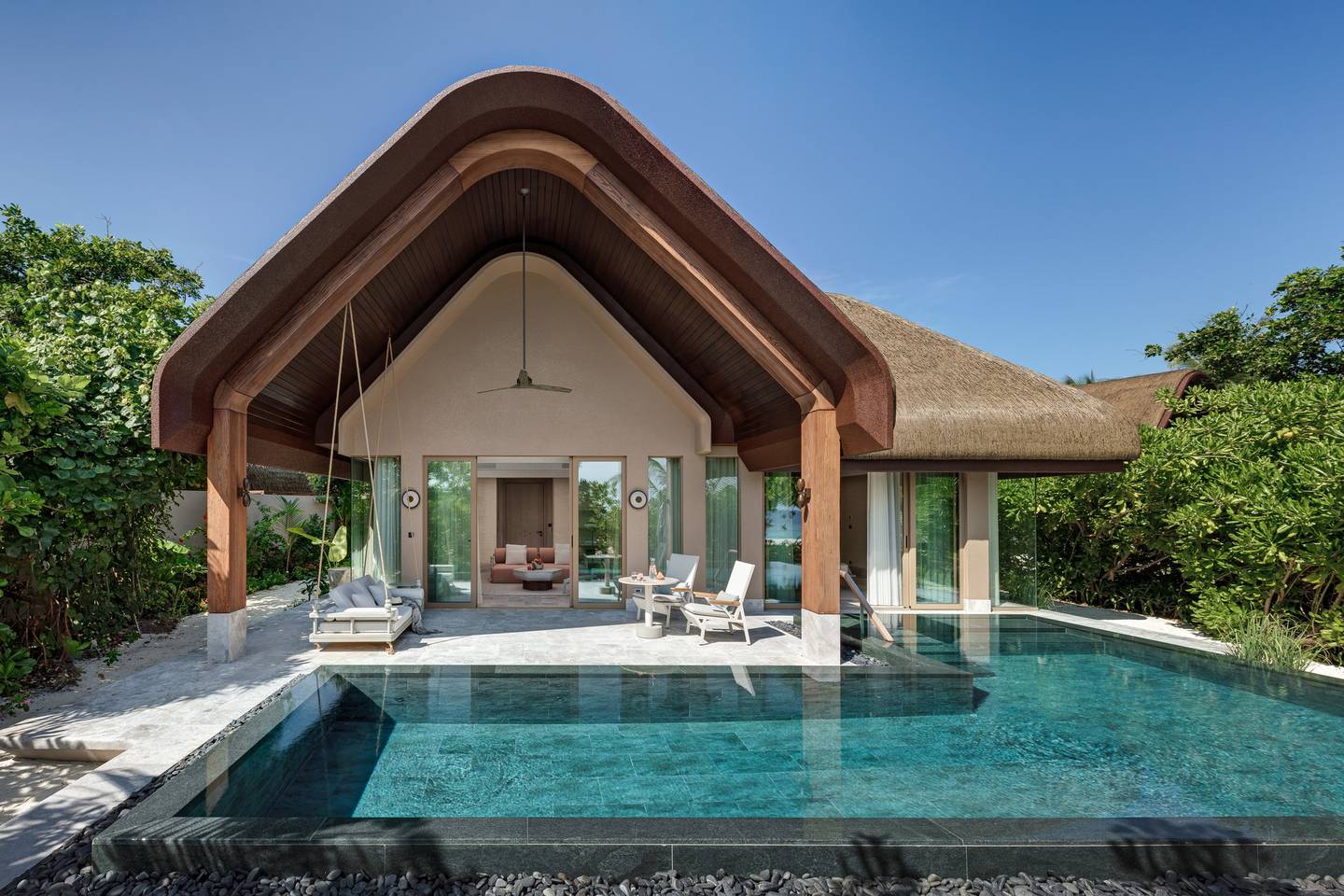 Each of the villas, designed in flowing lines and curves, has a private pool and a dedicated butler