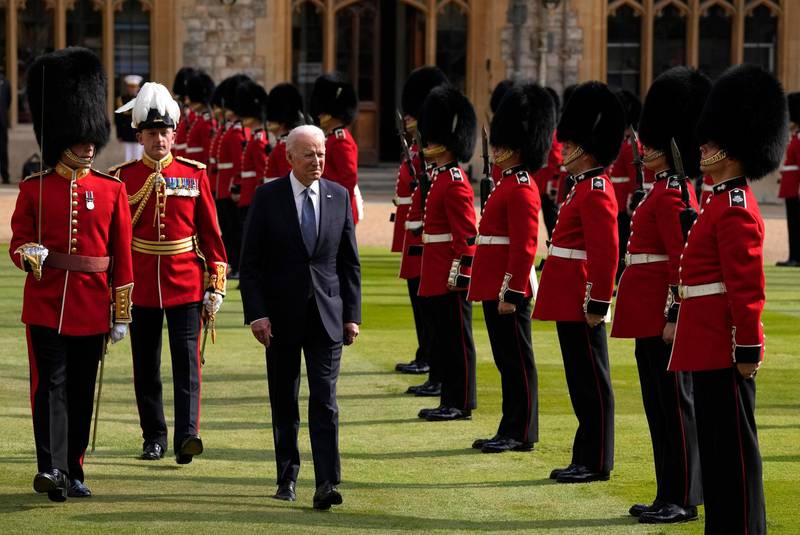 US President Joe Biden inspects a Guard of Honour at Windsor Castle. Getty Images