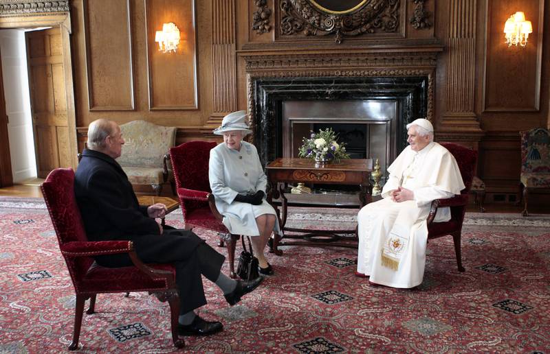 Britain's Queen Elizabeth II and Prince Philip with the Pope at the Palace of Holyroodhouse in Edinburgh, September 16, 2010. Reuters