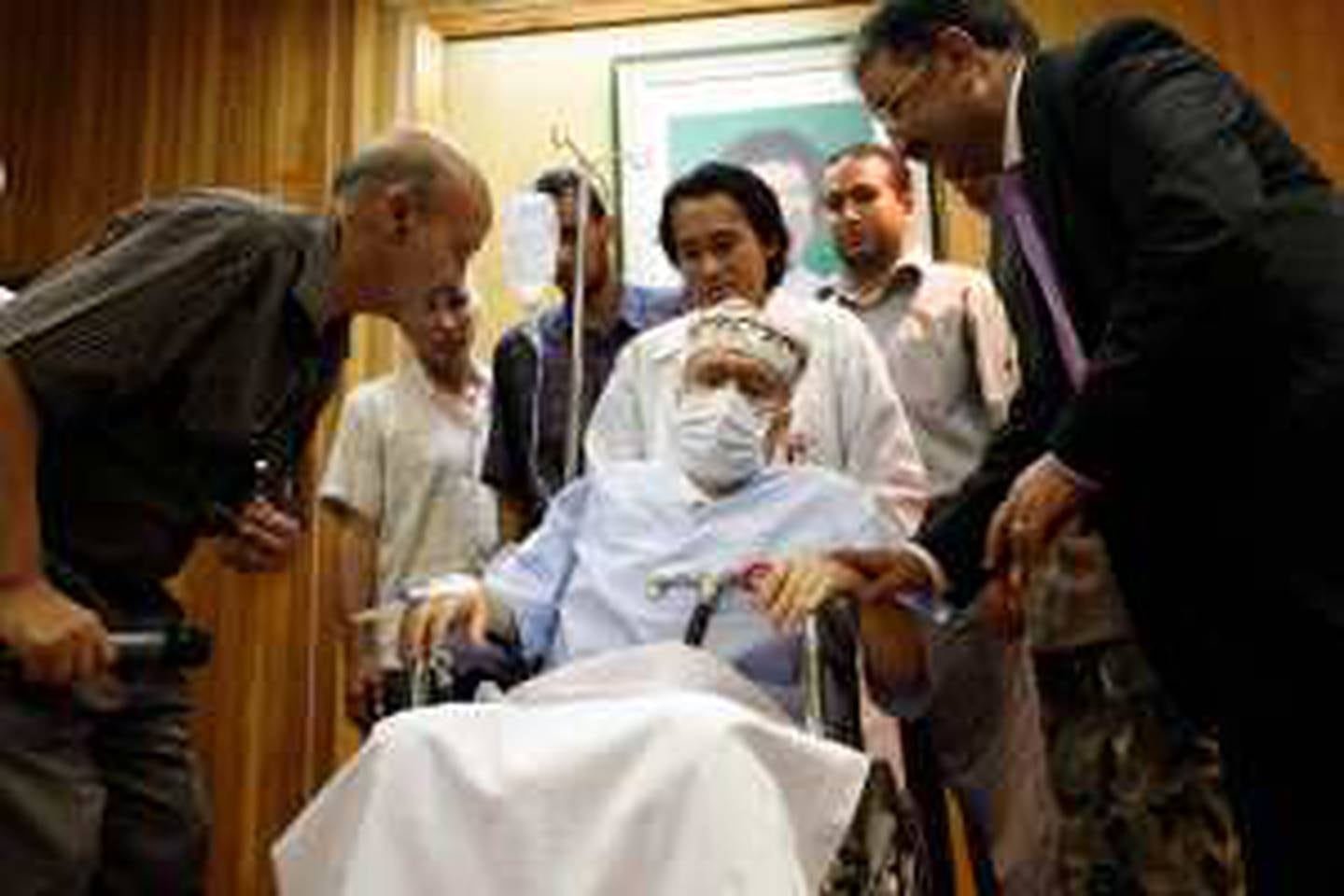 Abdel Basset al-Megrahi sits in a wheelchair in his room at a hospital in Tripoli September 9, 2009. The dying Libyan convicted of the 1988 Lockerbie bombing and freed on compassionate grounds despite U.S. objections was met by African parliamentary deputies on Wednesday in an apparent public show of support. REUTERS/Ismail Zetouny (LIBYA POLITICS IMAGES OF THE DAY)
