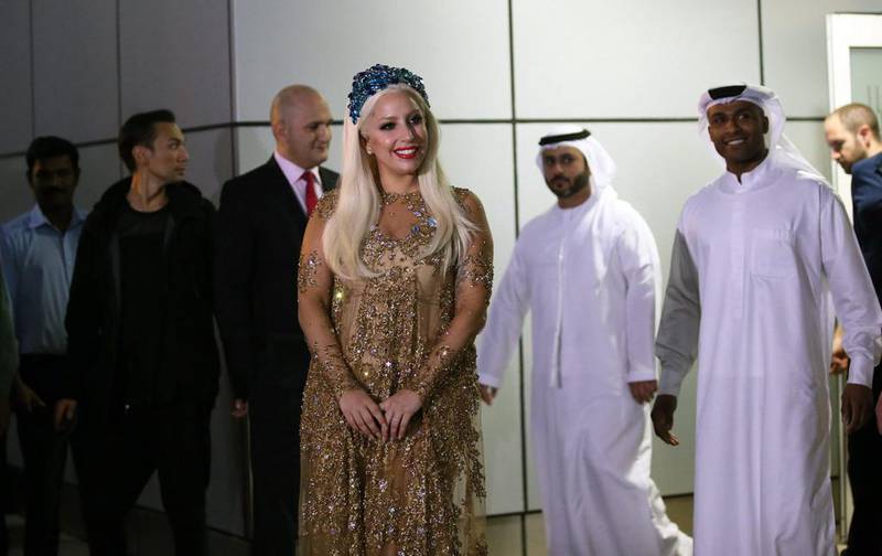 Lady Gaga, centre, arrives at Dubai Airport. Ali Haider / EPA