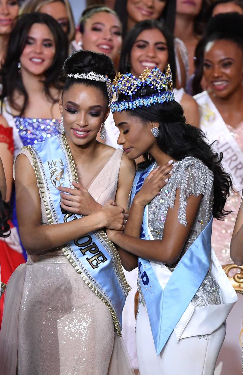Miss World 2019 Miss Jamaica Toni-Ann Singh (R) reacts  after being crowned with Miss Europe, Miss France Ophely Mezino (L) EPA