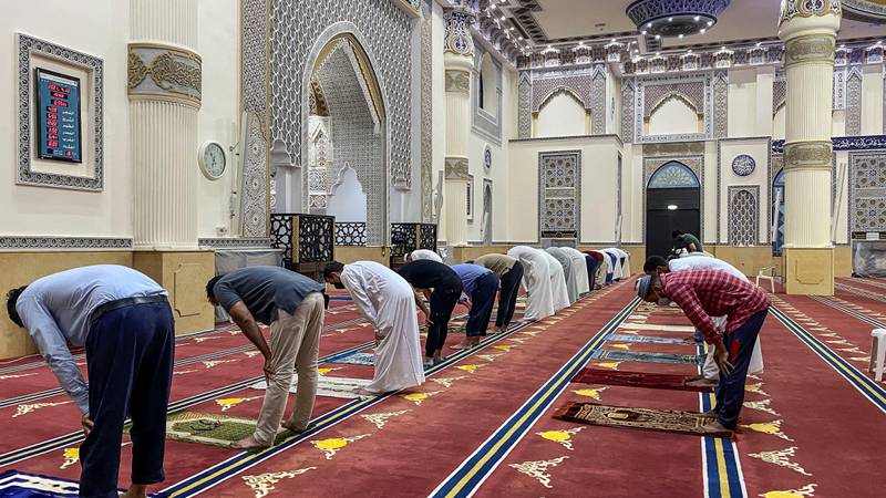 Worshippers pray at Al Farooq Omar Bin Al Khattab Mosque in Dubai during Ramadan. Antonie Robertson / The National