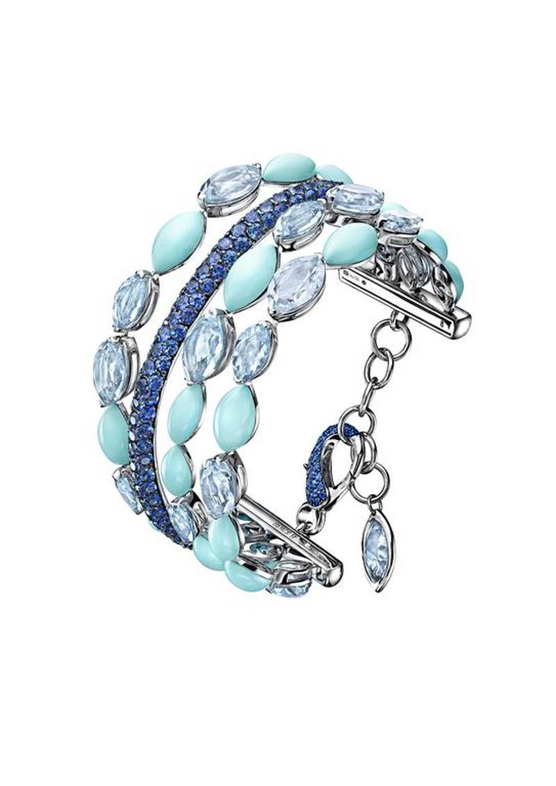 White gold bracelet from the Melody of Colours collection, featuring 16 aquamarines, 18 turquoises and 195 blue sapphires; Dh181,795. Courtesy de Grisogono.