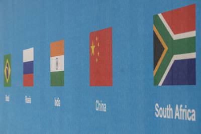 The national flags of Brazil, Russia, India, China and South Africa. Bloomberg