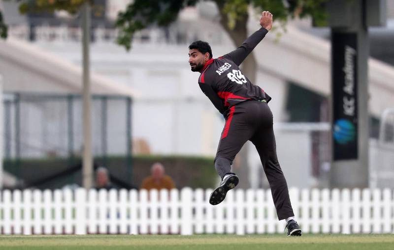 DUBAI, UNITED ARAB EMIRATES , Dec 15– 2019 :- Ahmed Raza of UAE bowling during the World Cup League 2 cricket match between UAE vs Scotland held at ICC academy in Dubai. ( Pawan Singh / The National )  For Sports. Story by Paul