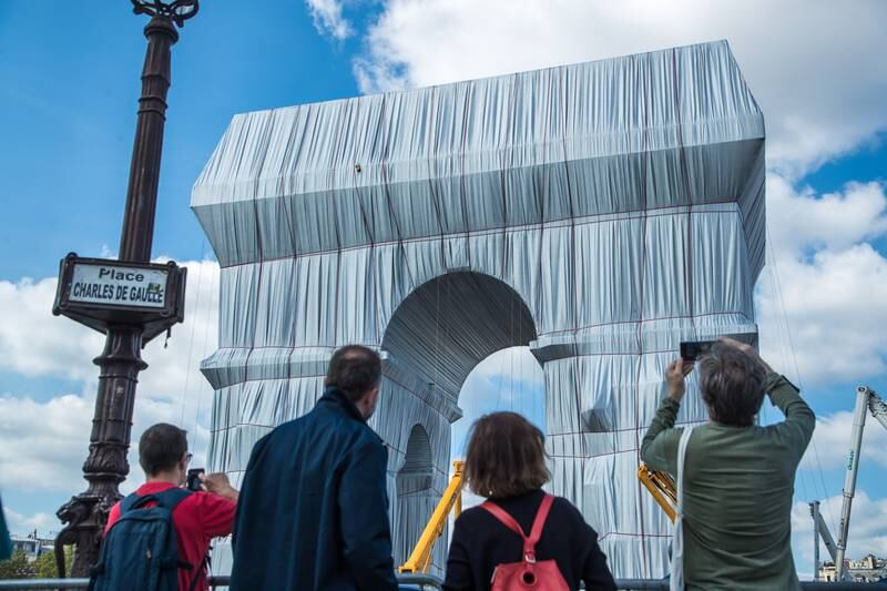 The Arc de Triomphe was wrapped as part of an art installation by late artists Christo and Jean Claude in Paris in September 2021. EPA 