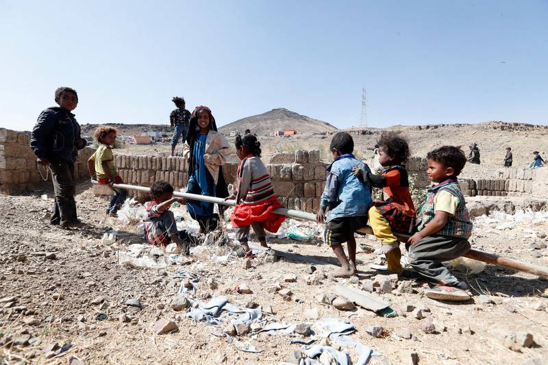 Displaced Yemeni children play at a camp for Internally Displaced Persons (IDPs) on the outskirts of Sana'a, Yemen. EPA