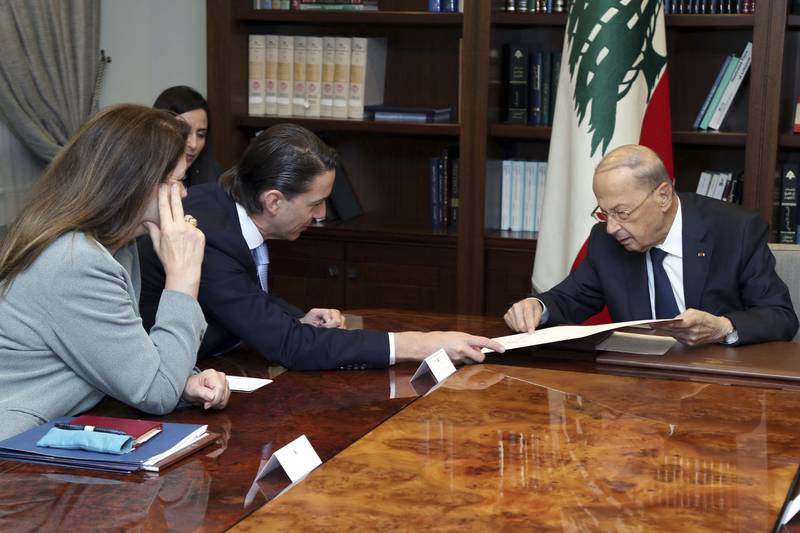 Lebanese President Michel Aoun, right, meets with US envoy Amos Hochstein, centre left, for talks on the disputed maritime border between Lebanon and Israel. AP