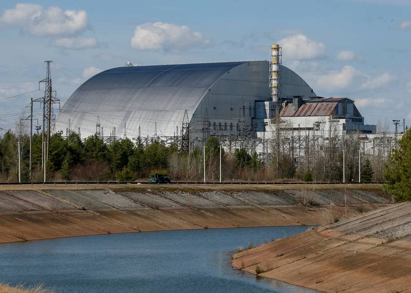The damaged fourth reactor at the Chornobyl Nuclear Power Plant in Ukraine, pictured last April. The country's war with Russia has had a major effect on the global energy transition. Reuters