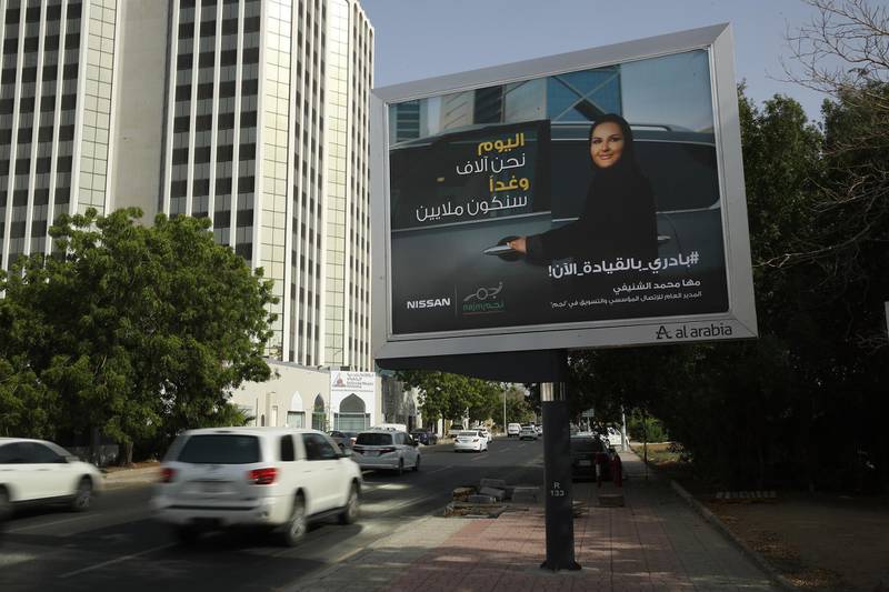 JEDDAH, SAUDI ARABIA - JUNE 24:  An advertising billboard for Japanese automaker Nissan shows a woman about to get into a car on the day women are legally allowed to drive in Saudi Arabia on June 24, 2018 in Jeddah, Saudi Arabia. "Today is such a historical day, we've been waiting for this for such a long time," she said. Saudi Arabia has today lifted its ban on women driving, which had been in place since 1957. The Saudi government, under Crown Prince Mohammad Bin Salman, is phasing in an ongoing series of reforms to both diversify the Saudi economy and to liberalize its society. The reforms also seek to empower women by restoring them basic legal rights, allowing them increasing independence and encouraging their participation in the workforce. Saudi Arabia is among the most conservative countries in the world and women have traditionally had much fewer rights than men.  (Photo by Sean Gallup/Getty Images)