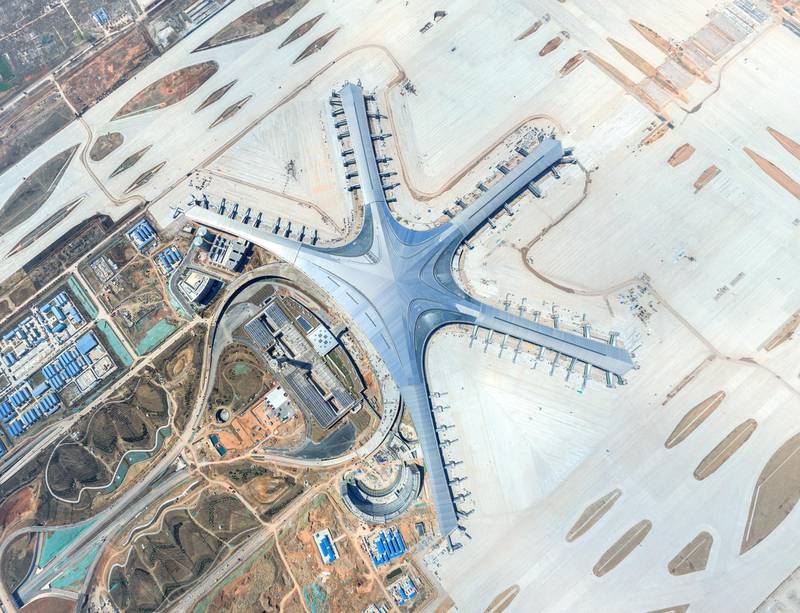 --FILE--The Qingdao Jiaodong International Airport is under construction in Qingdao city, east China's Shandong province, 10 May 2019.

The project - Qingdao Jiaodong International Airport - broke ground in 2015. Construction of the main structures has now been completed and both decoration and the installation of equipment are underway.No Use China. No Use France.