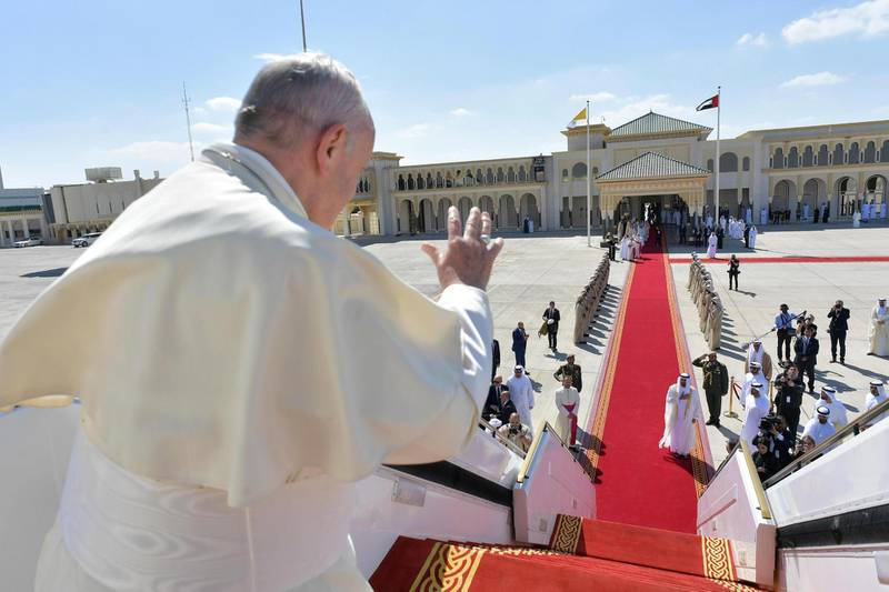 Pope Francis waves to Sheikh Mohammed as he boards the Etihad Boeing 787 Dreamliner. Vatican Media / EPA