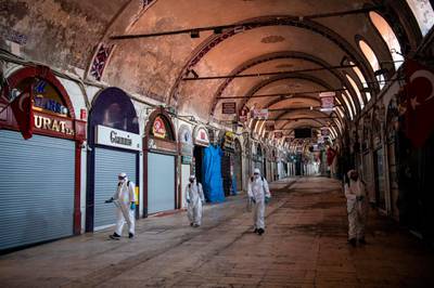 Municipal workers disinfect the historic Grand Bazaar in Istanbul, Turkey. AFP