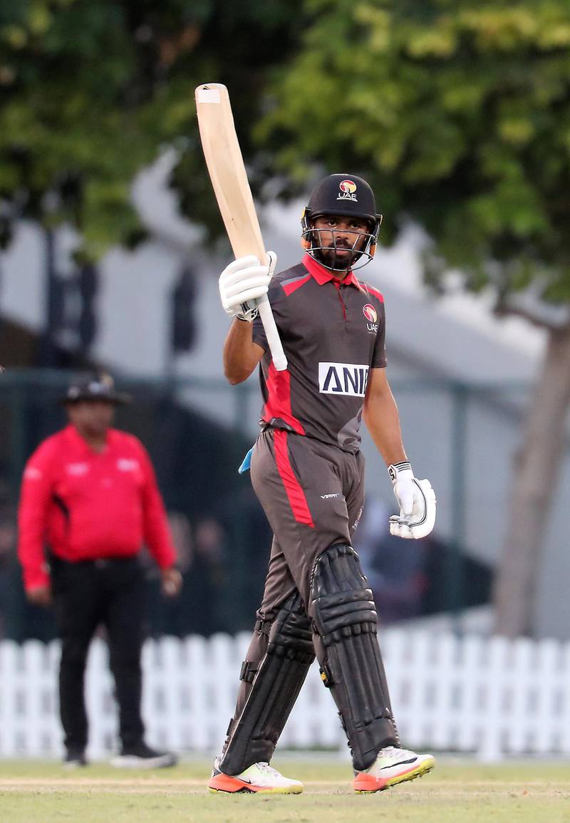 DUBAI, UNITED ARAB EMIRATES , Dec 15– 2019 :- Basil Hameed of UAE celebrating after scoring his half century during the World Cup League 2 cricket match between UAE vs Scotland held at ICC academy in Dubai. UAE won the match by 7 wickets. He scored not out 63 runs in this match. ( Pawan Singh / The National )  For Sports. Story by Paul