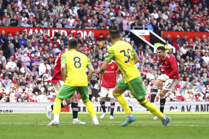 Manchester United's Cristiano Ronaldo scores his third goal in the Premier League match against Norwich City at Old Trafford in April, 2022. AP