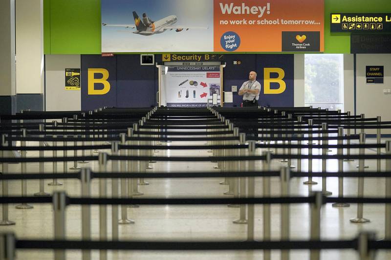 MANCHESTER,  - SEPTEMBER 23:  An empty check in area at Manchester Airport after Thomas Cook collapsed at Manchester Airport on September 23, 2019 in Manchester, United Kingdom. The collapse of the 178-year-old travel firm triggered a massive repatriation effort, as the British Civil Aviation Authority chartered aircraft to bring around 150,000 travelers back to the UK. The firm's closure also jeopardized 22,000 jobs worldwide, including 9,000 in the UK. (Photo by Christopher Furlong/Getty Images)