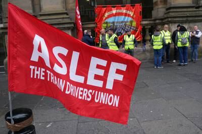 Members of the train drivers' union Aslef on the picket line outside Newcastle station on Wednesday. PA