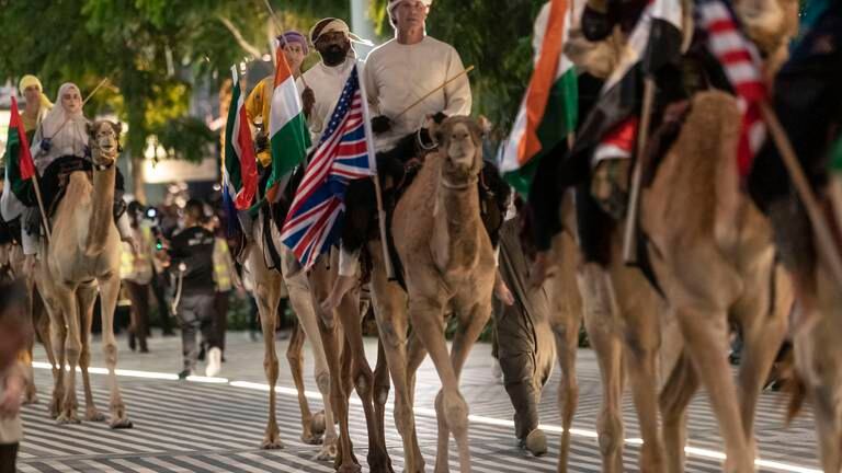 An image that illustrates this article Camel trekkers at expo - in pictures