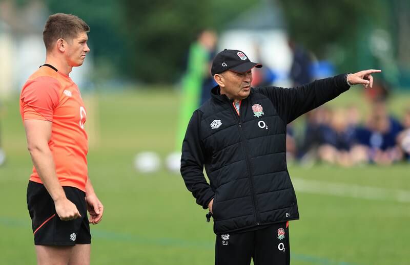 England fly-half Owen Farrell speaks with Eddie Jones during a training session during the England Captain's Run on May 24, 2022 in Chiswick, England. Getty Images