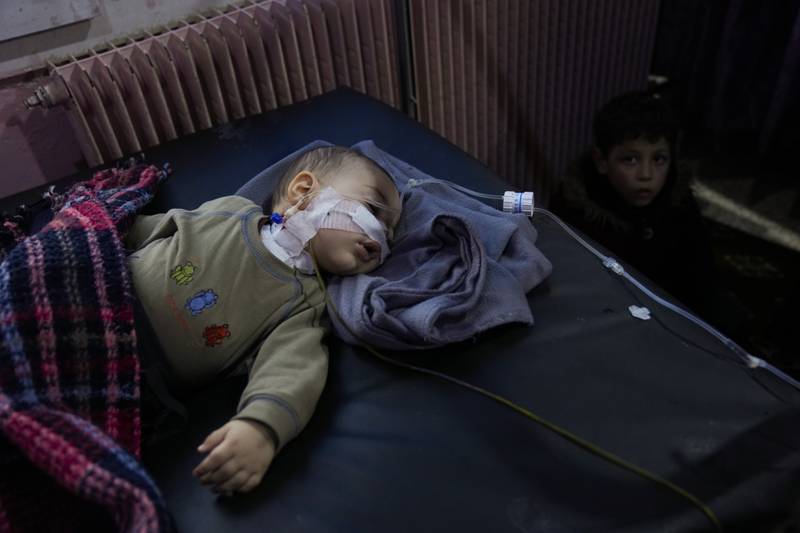 A child, injured in the earthquake, is treated at hospital in Bab Al Hawah, Syria. AP Photo 