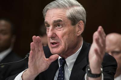 Robert Mueller testifies during a Senate hearing in May 16, 2013, while he was in charge of the FBI. Brendan Smialowski / AFP