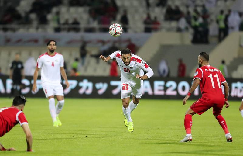 SHARJAH , UNITED ARAB EMIRATES , January  6 ��� 2019 :- Mohammed Darwish ( no 23 in white ) of Palestine in action during the AFC Asian Cup UAE 2019 football match between Syria vs Palestine held at Sharjah Football Stadium in Sharjah. ( Pawan Singh / The National ) For News/Sports