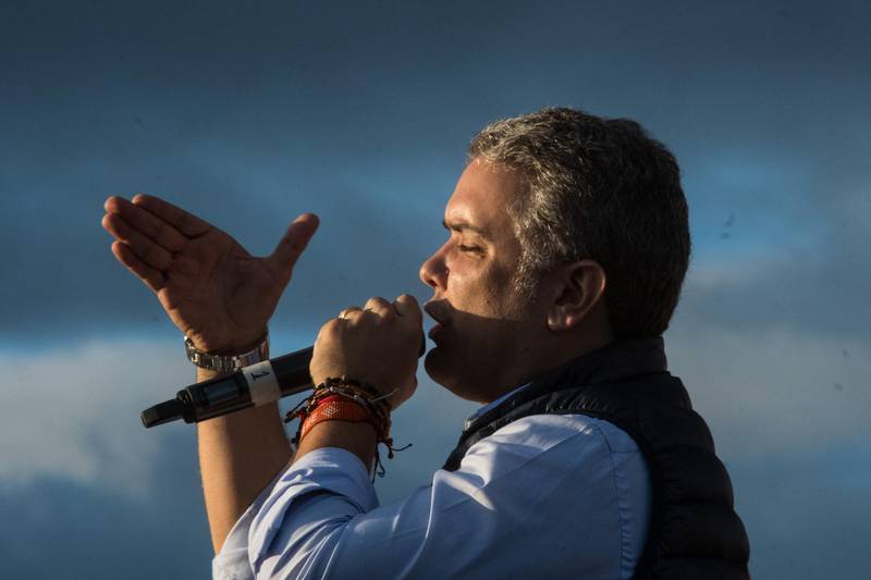 Ivan Duque, presidential candidate for the Democratic Center Party, speaks during the closing campaign rally in Bogota, Colombia, on Sunday, May 20, 2018. Colombians vote in the first round of presidential elections on May 27, with a run-off vote on June 17 should no one candidate get more than 50 percent of the vote. Photographer: Mauricio Palos/Bloomberg
