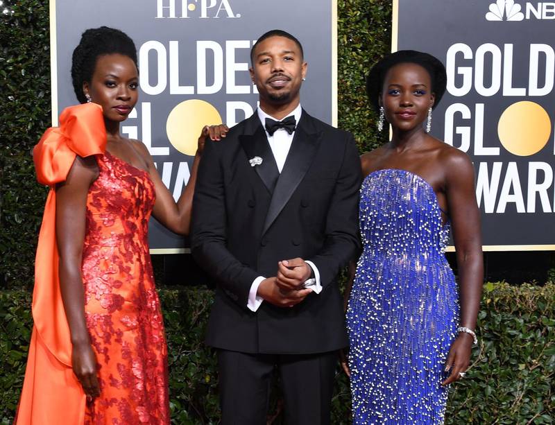 Lupita Nyong'o, Michael B Jordan and Danai Gurira arrive for the Golden Globes. AFP