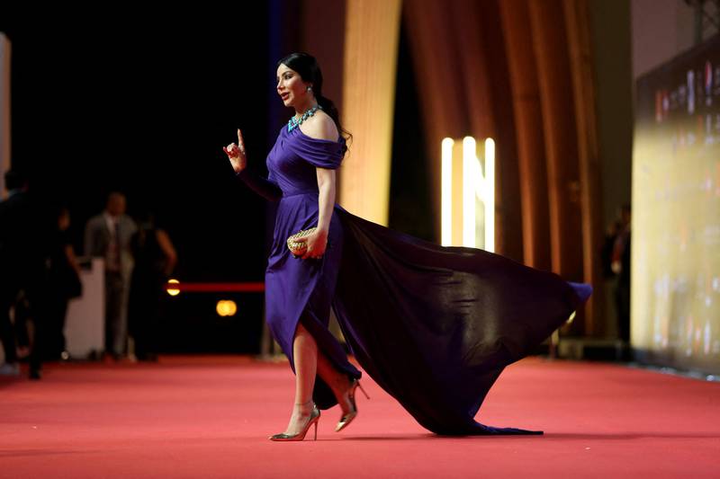 Saudi TV celebrity Lojain Omran walks on the red carpet at the festival