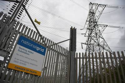 Electricity pylons in London. Britain will be particularly vulnerable to power cuts in early 2023 if there is a severe weather event. AFP