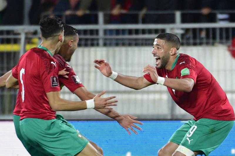 Morocco's players celebrate a goal. AFP