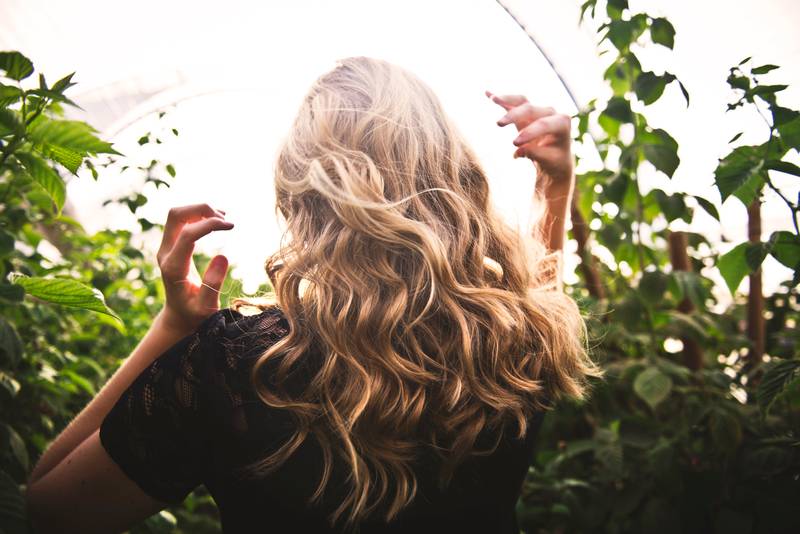 Hair filling is an effective way to add volume to thinning locks, and lasts longer than traditional extensions. Photo: Tim Mossholder / Unsplash