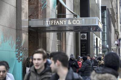 Pedestrians pass in front of the Tiffany & Co. flagship store on Fifth Avenue in New York, U.S., on Monday, March 13, 2017. Tiffany & Co. is scheduled to release earnings figures on March 17. Photographer: Victor J. Blue/Bloomberg