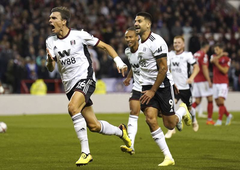 Fulham's Joao Palhinha, left, after scoring at the City Ground in Nottingham. AP