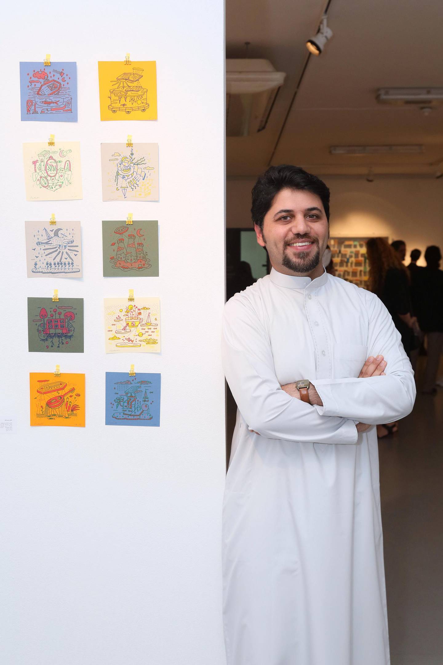Nasir Nasrallah with his work, ‘The Atlas of Imaginary Places’. Courtesy of Tashkeel